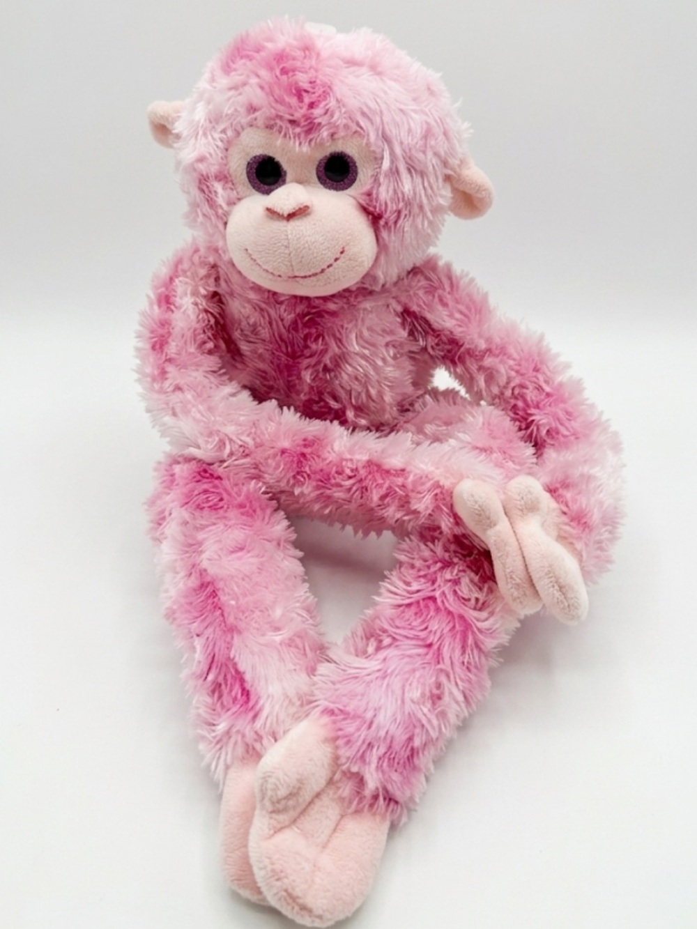 Amazon Pink Plush Monkey Soft Cuddly Toy